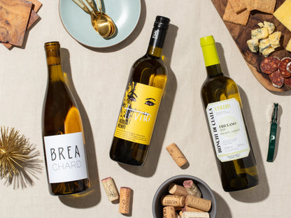 Plonk White Wine Club with various bottles of white wines and various hors d